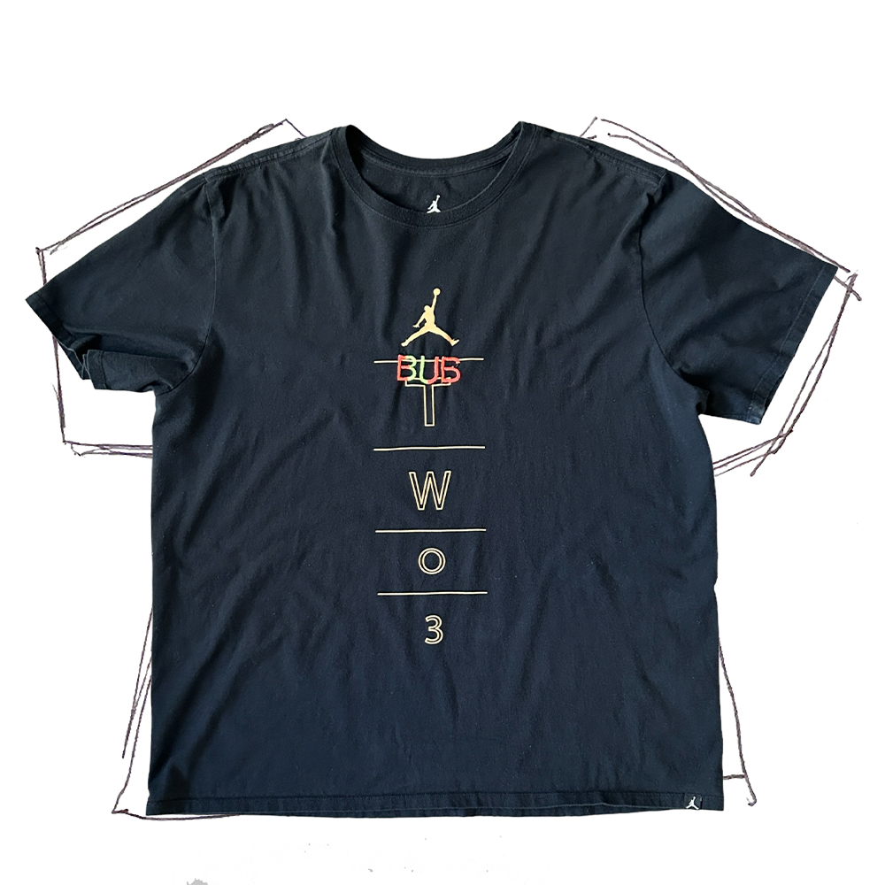 front of t-shirt, black t-shirt with gold graphic/text — air jordan, "TWo3" vertical in center of shirt, with neon salmon, neon green, and black "BUB" embroidery